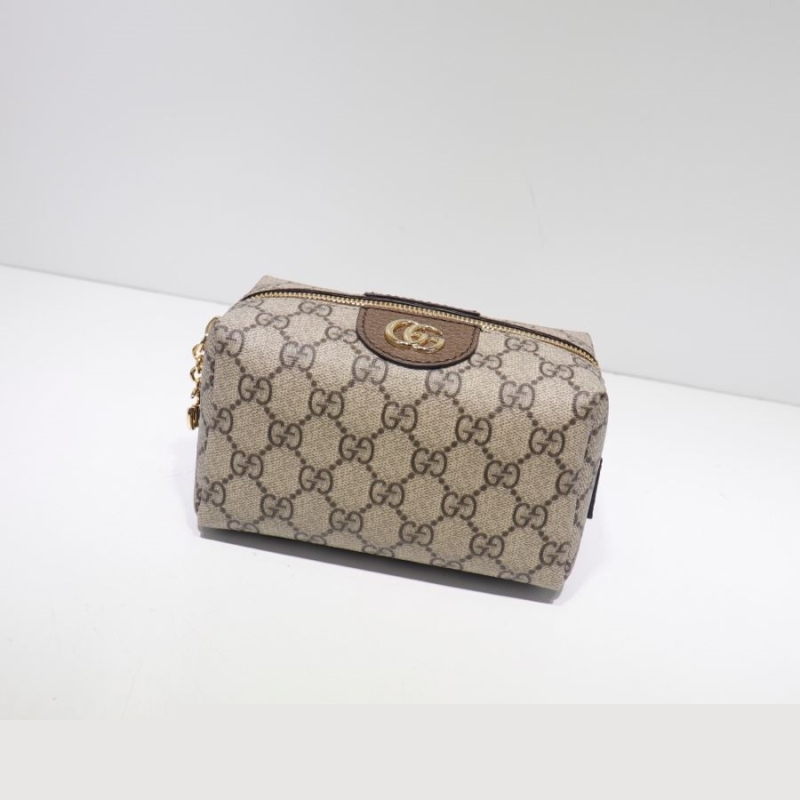 G*u*i clutch bags